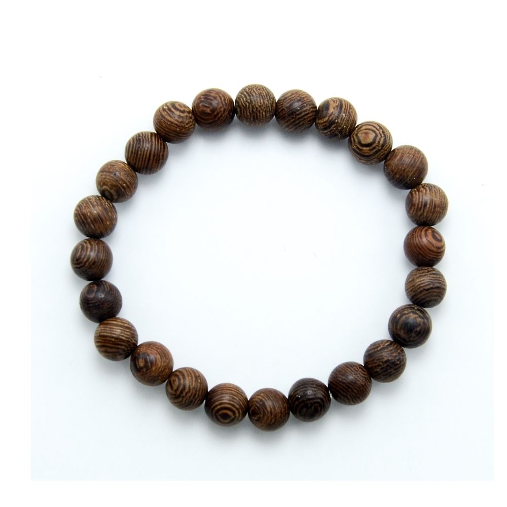 Zoëies houten armband met houten kralen en uil Zoëies houten armband met houten kralen en uil