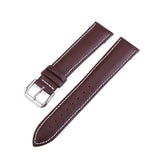 Horlogeband met strakke vintage look. Bruin leer met wit stiksel en roestvrij stalen gesp. Fashion, mode, horloge heren
