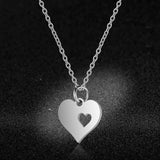 Damesketting van roestvrij staal. hartje, zilverkleurig. Mode, fashion, accessoires.