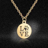 Damesketting van roestvrij staal. Love my dog, goudkleurig. Mode, fashion, accessoires.