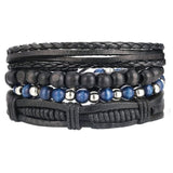 Heren brede armband in donkere natuurkleuren. Gemaakt van kralen, metaal, touw en leer.