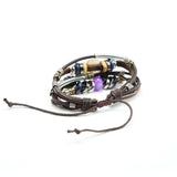 Heren brede armband. Boho en hippie stijl met detail van een vis. Geïnspireerd op de jaren '60 en '70. Gemaakt van kralen, metaal, touw en leer.5