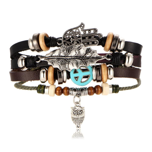 Heren brede armband. Boho en hippie stijl met boeddhistische tekens. Geïnspireerd op de jaren '60 en '70. Gemaakt van kralen, metaal, touw en leer.