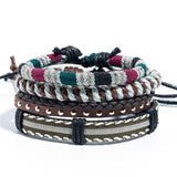 Heren brede armband bestaande uit 4 delen. Gemaakt van metaal, touw en leer.