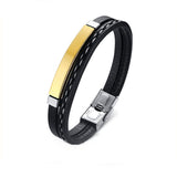 Heren armband clean design met zwart leer, roestvrij staal en goudkleurig accent. Fashion, mode