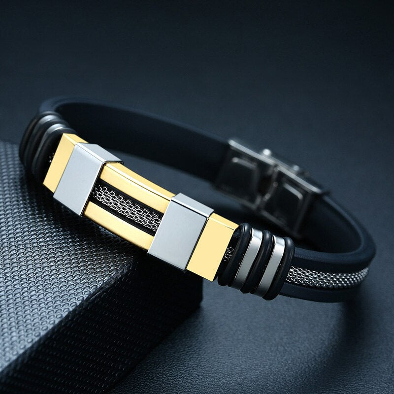 Heren armband clean design met zwart rubber, roestvrij staal in de kleuren goud en zilver. Fashion, mode
